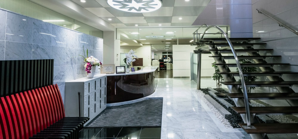 The reception lobby, decorated with foliage plants
